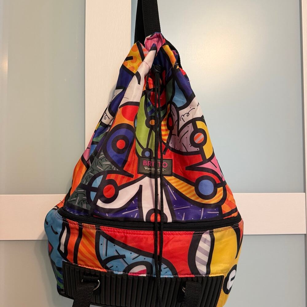 Britto Romero “a new day” Pop Art Drawstring Backpack Multicolor